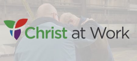 Christ at work logo social image logo over a washed out image of two men praying together in the workplace